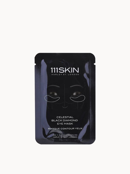 A single-use black eye mask sachet from 111SKIN on a clean white background.