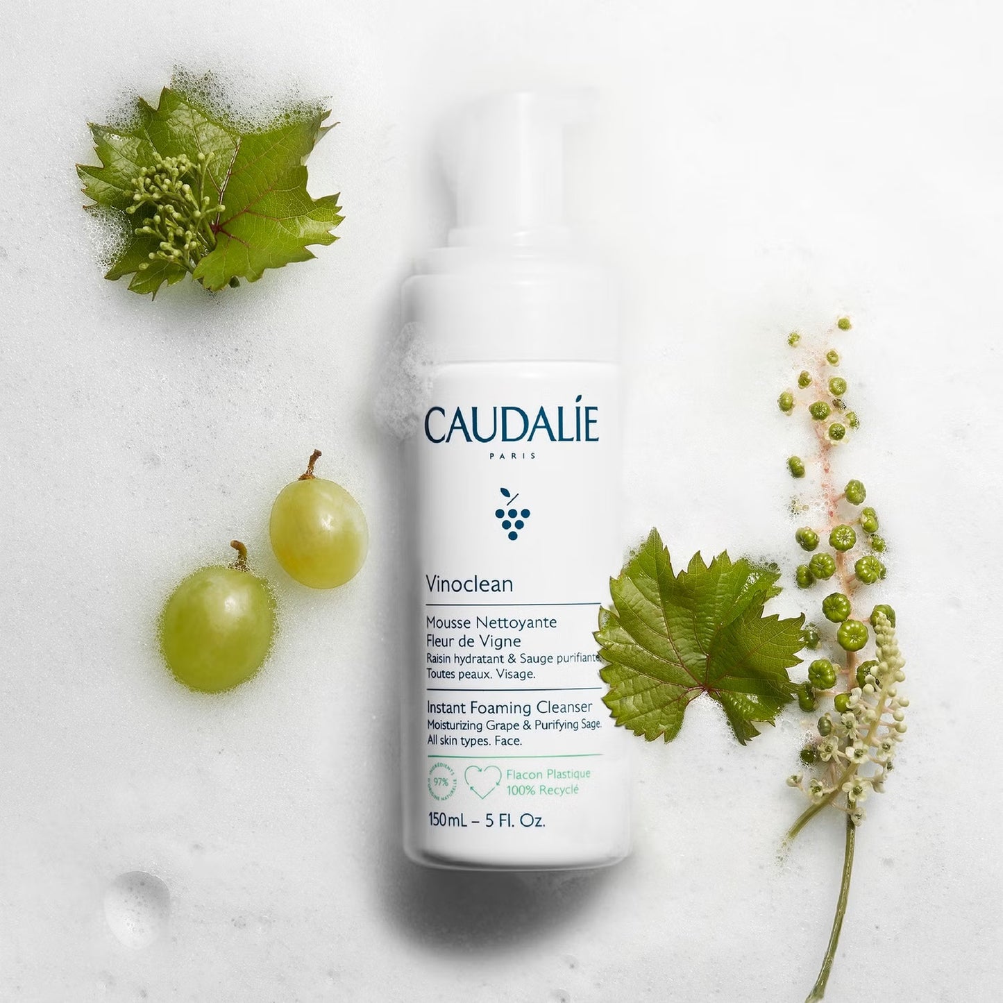 Caudalie Vinoclean Instant Foaming Cleanser Duo for skincare, showing two bottles with white foam and clear packaging.