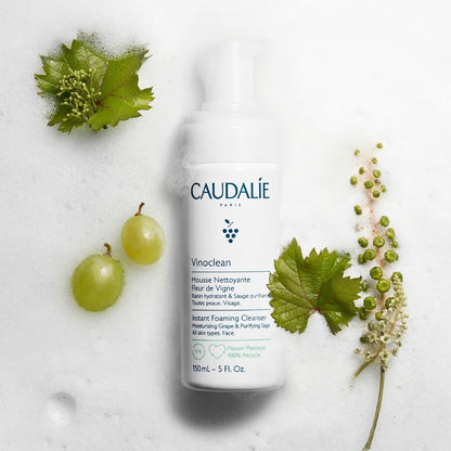 Caudalie Vinoclean Instant Foaming Cleanser Duo for skincare, showing two bottles with white foam and clear packaging.