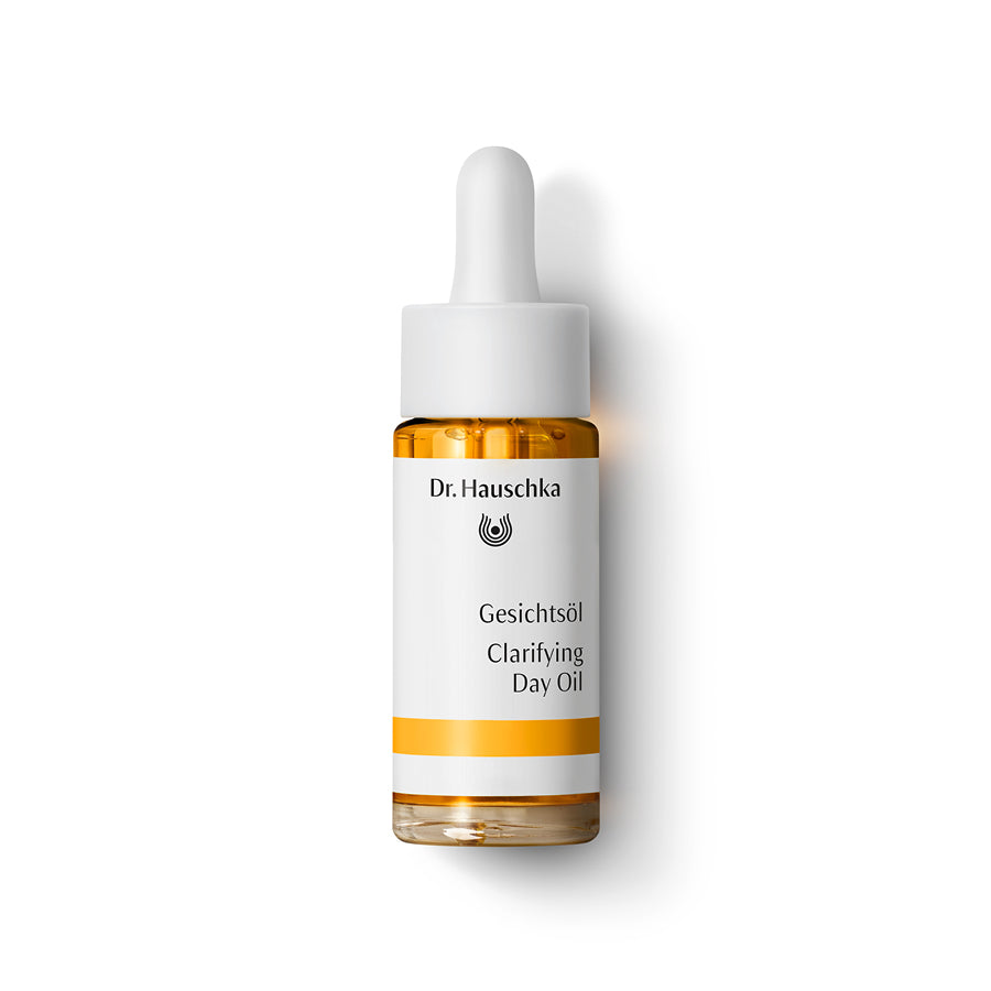 Dr. Hauschka Clarifying Day Oil face serum in 18 ml bottle, designed for oily, blemished skin with natural ingredients.