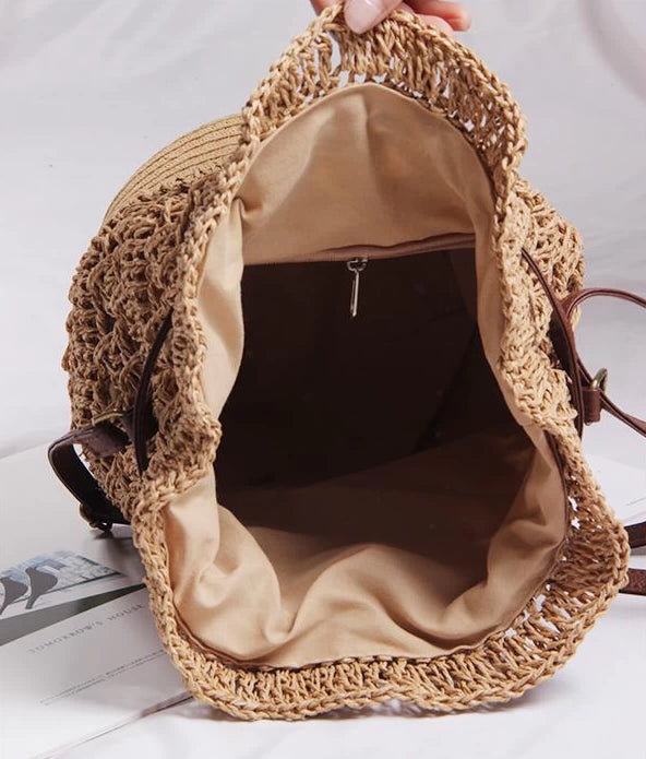 Women’s camel raffia bucket handbag by Grace Beauty featuring woven texture and sturdy handles.