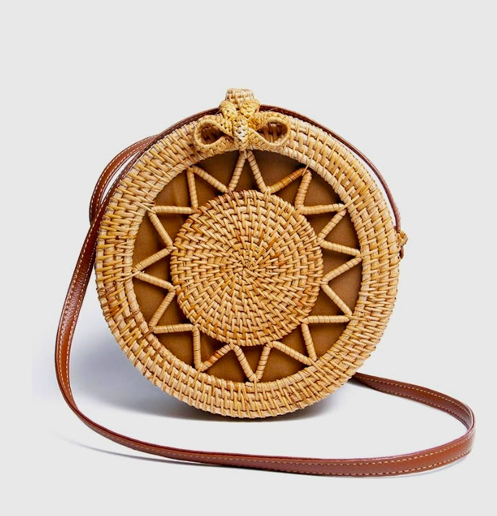 Women’s round raffia crossbody bag by Grace Beauty, handwoven bohemian shoulder purse perfect for beach and casual wear.