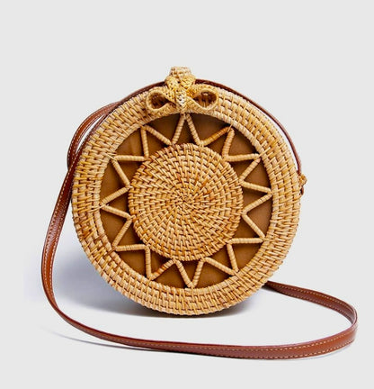 Women’s round raffia crossbody bag by Grace Beauty, handwoven bohemian shoulder purse perfect for beach and casual wear.
