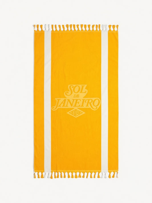 Sol de Janeiro Badalada beach towel featuring vibrant tropical print, soft fabric, perfect for lounging at the beach or poolside.