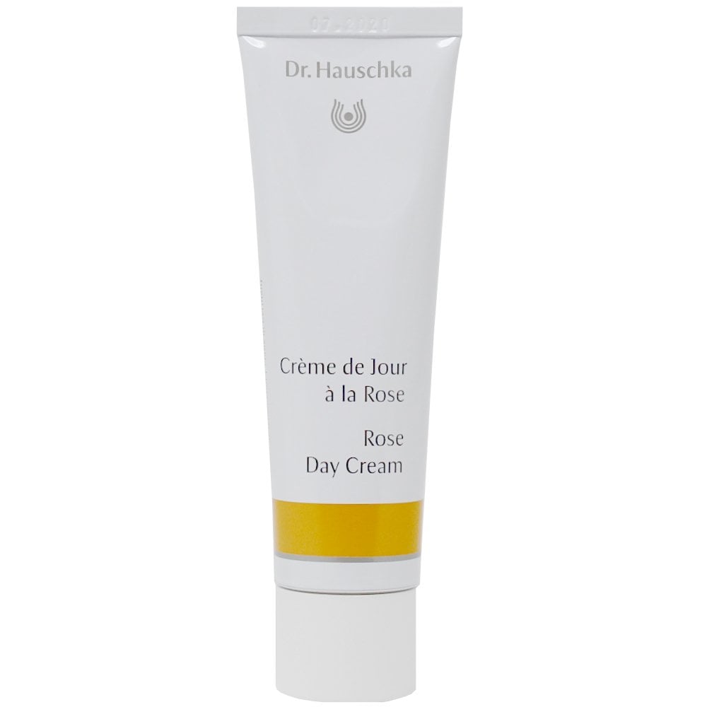 Dr. Hauschka Rose Day Cream 30ml moisturizer for sensitive skin, featuring a soft pink cream in a glass jar with rose petals.