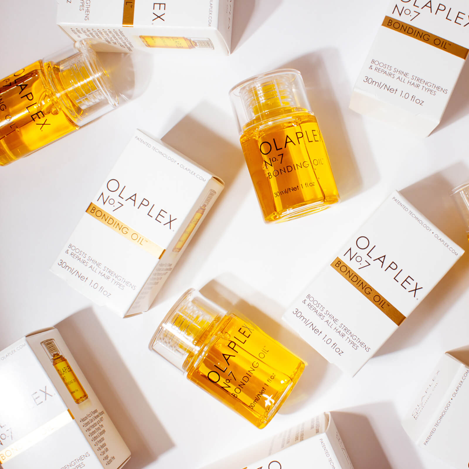 Olaplex No.7 Bonding Oil 30ml for hair care, displaying a sleek bottle with dropper cap, designed to improve hair strength and shine.